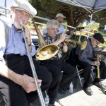 picture of the band with slide trombone in foreground.