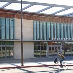 Cyclist riding in front of the finished ERC
