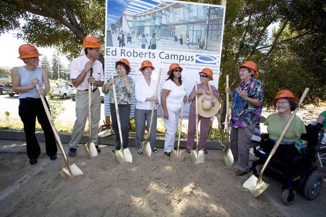 People with shovels at the groundbreaking ceremony